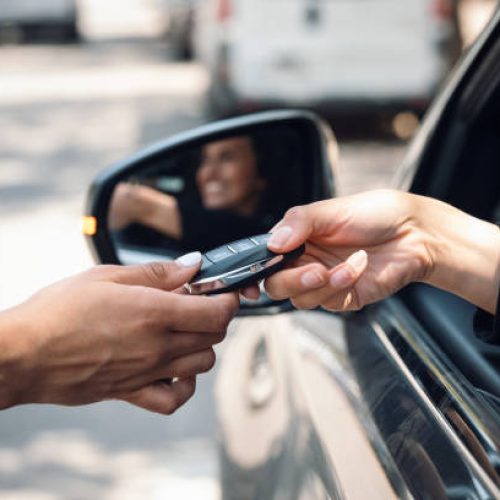 images of a owner giving his car keys