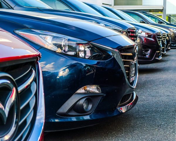 rental cars line up in a row